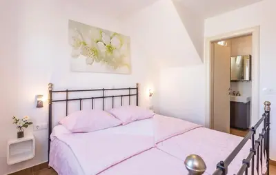 Krevet ili kreveti u jedinici u objektu Villa Kristina - Ferienhaus Baška Voda - Topići, Private Outdoor Swimmingpool