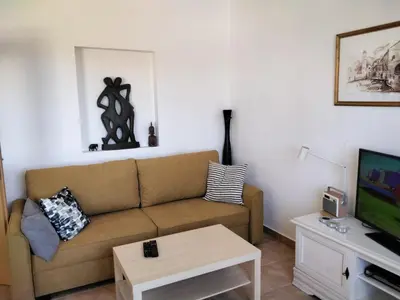 TV i/ili zabavni centar u objektu Apartments Loris