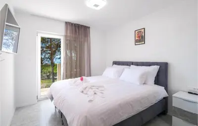 Krevet ili kreveti u jedinici u objektu Cozy Home In Sumartin
