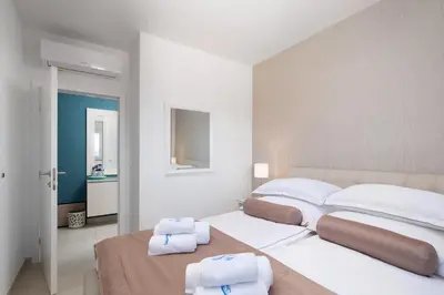 Krevet ili kreveti u jedinici u objektu A&D Deluxe Penthouse Apartment Dani