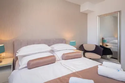 Krevet ili kreveti u jedinici u objektu A&D Deluxe Penthouse Apartment Dani