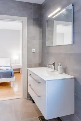 Krevet ili kreveti u jedinici u objektu Lion's Beach Starlight Apartment