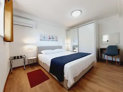 Krevet ili kreveti u jedinici u objektu White House apartments