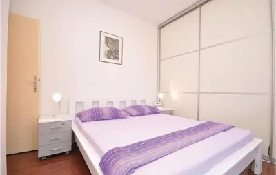 Krevet ili kreveti u jedinici u objektu Apartment Supetar Ive Vojnovica