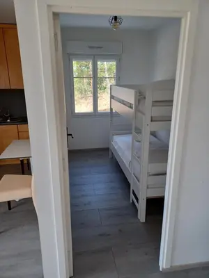 Krevet ili kreveti u jedinici u objektu APARTMANI JELIĆ