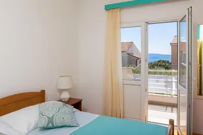 Krevet ili kreveti u jedinici u objektu Terra Beach Apartment