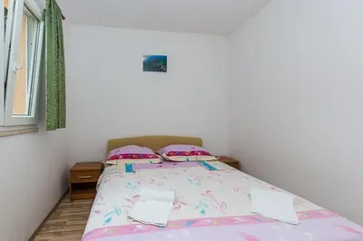 Krevet ili kreveti u jedinici u objektu Robinson Medvidna Hvar Apartments