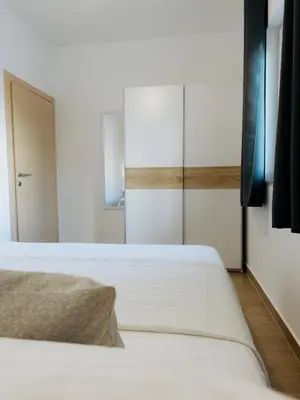 Krevet ili kreveti u jedinici u objektu Apartments Piscina-Blue