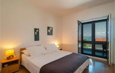 Krevet ili kreveti u jedinici u objektu Beautiful Apartment In Sutivan With Wifi