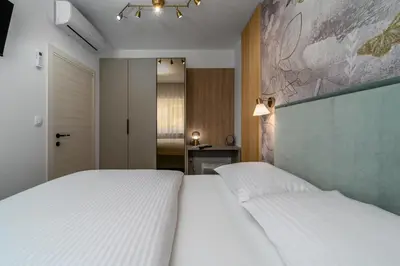 Krevet ili kreveti u jedinici u objektu Villa Stella with 32 sqm private heated pool Jacuzzi Sauna Media room 3 bedrooms