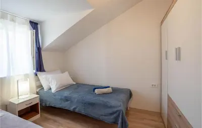 Krevet ili kreveti u jedinici u objektu 3 Bedroom Cozy Home In Povlja