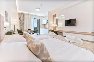 Krevet ili kreveti u jedinici u objektu Aparthotel Remaneo