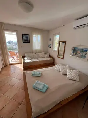 Krevet ili kreveti u jedinici u objektu Casa Poseidon