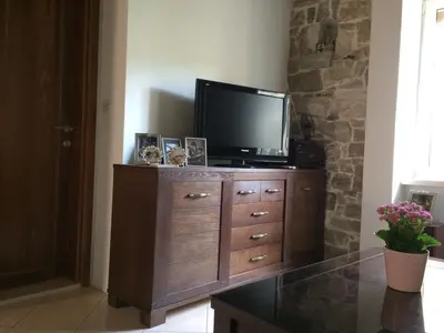 TV i/ili zabavni centar u objektu Apartman Lana Beachfront