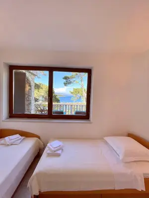 Krevet ili kreveti u jedinici u objektu dinka seaside villa - hvar island