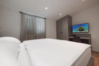 Krevet ili kreveti u jedinici u objektu Apartmani Stipe Brela
