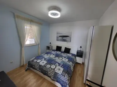 Krevet ili kreveti u jedinici u objektu Blue Beach Villa with BBQ, Wifi and Stunning View