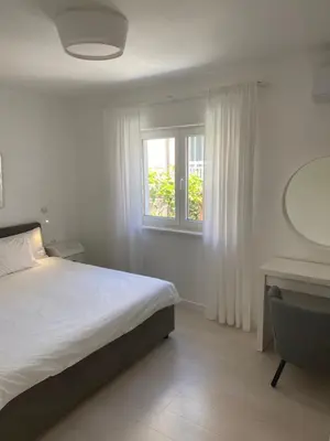 Krevet ili kreveti u jedinici u objektu FeelAtHome Hvar Apartments