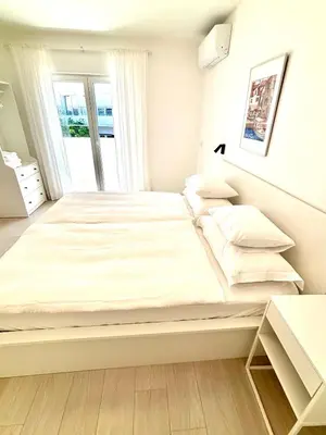 Krevet ili kreveti u jedinici u objektu FeelAtHome Hvar Apartments