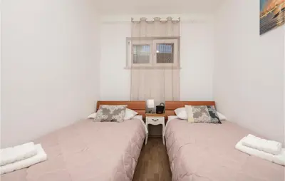 Krevet ili kreveti u jedinici u objektu Four-Bedroom Holiday Home In Bast