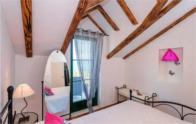 Krevet ili kreveti u jedinici u objektu 3 Bedroom Cozy Home In Gromin Dolac