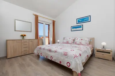 Krevet ili kreveti u jedinici u objektu Panorama Apartment