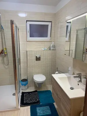 Kupaonica u objektu Schönes Apartment ALINA,mit Meerblick ,Strand 100m