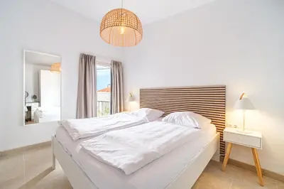 Krevet ili kreveti u jedinici u objektu Villa & Studio Luke, Luxe accommodatie, unieke locatie bij de mooiste zandbaai