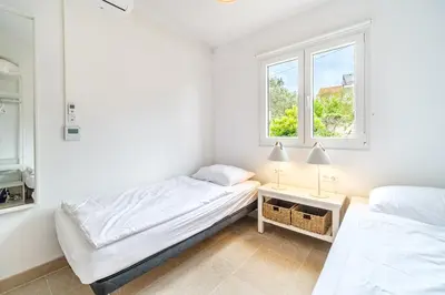 Krevet ili kreveti u jedinici u objektu Villa & Studio Luke, Luxe accommodatie, unieke locatie bij de mooiste zandbaai