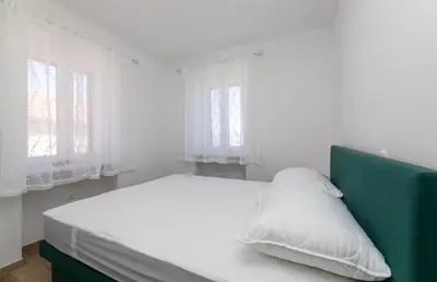 Krevet ili kreveti u jedinici u objektu Apartmani Čanaki Supetar