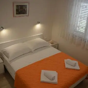 Krevet ili kreveti u jedinici u objektu Apartments Leon