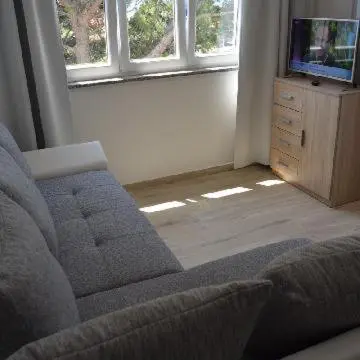 TV i/ili zabavni centar u objektu Apartments Leon