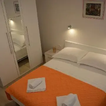 Krevet ili kreveti u jedinici u objektu Apartments Leon