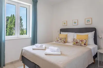 Krevet ili kreveti u jedinici u objektu Vila Božić Hvar