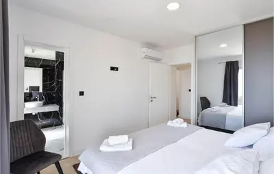 Krevet ili kreveti u jedinici u objektu Awesome Home In Makarska