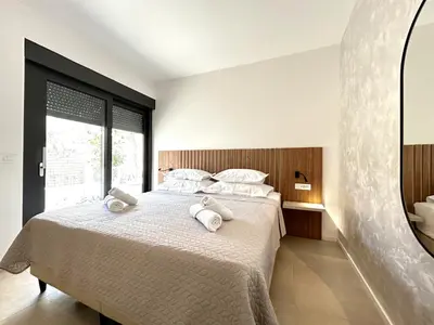 Krevet ili kreveti u jedinici u objektu Sandi Hvar Apartments