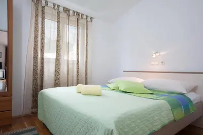 Krevet ili kreveti u jedinici u objektu Katja Apartments