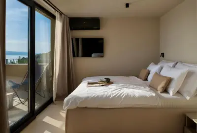 Krevet ili kreveti u jedinici u objektu Luxauthentic villa with heated pool SALT STONE - sauna, jacuzzi, gym, outdoor kitchen with bbq