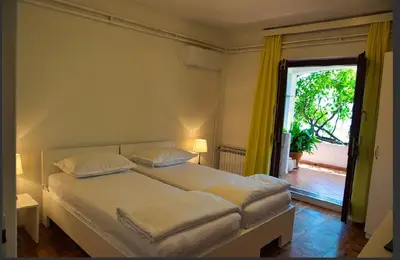 Krevet ili kreveti u jedinici u objektu Apartments Kokić