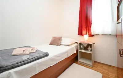 Krevet ili kreveti u jedinici u objektu 3 Bedroom Lovely Home In Blato Na Cetini