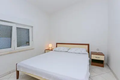 Krevet ili kreveti u jedinici u objektu Apartments with WiFi Stanici, Omis - 19941