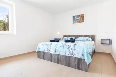 Krevet ili kreveti u jedinici u objektu White Stone House