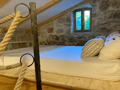 Krevet ili kreveti u jedinici u objektu Il Melograno Vrbanj Hvar
