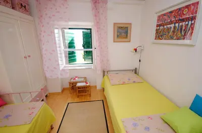 Krevet ili kreveti u jedinici u objektu Antique apartment in the center of Brela