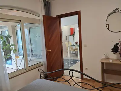 Krevet ili kreveti u jedinici u objektu Luksuzna villa sa privatnim unutarnjim bazenom Villa Garden