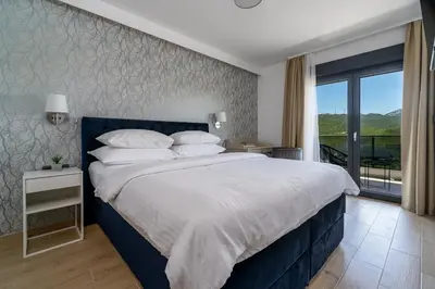 Krevet ili kreveti u jedinici u objektu Villa Neda Heated Pool, Hot-tub, Sauna, 3 bedrooms