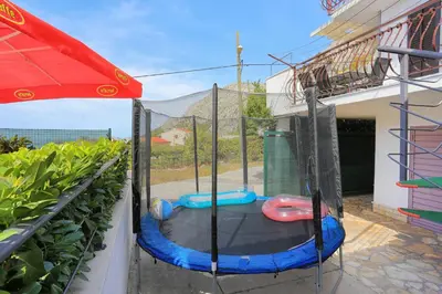 Popločani dio dvorišta ili vanjski dio objekta Family friendly house with a swimming pool Gornje Sitno, Split - 20009