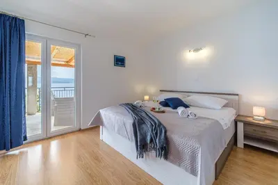 Krevet ili kreveti u jedinici u objektu Rooms Plaža Divuje