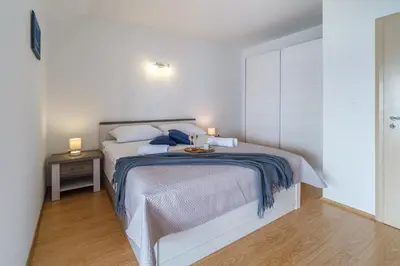 Krevet ili kreveti u jedinici u objektu Rooms Plaža Divuje