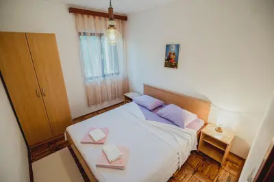 Krevet ili kreveti u jedinici u objektu Apartments Antun